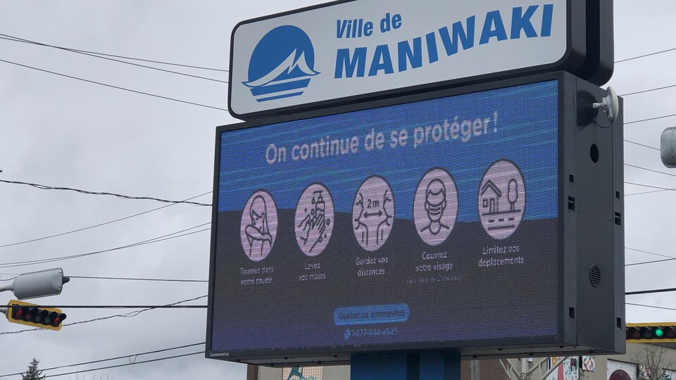 Une affiche rappelant les mesures sanitaire.