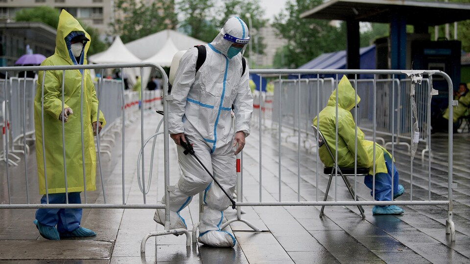 A man is cleaning the street.
