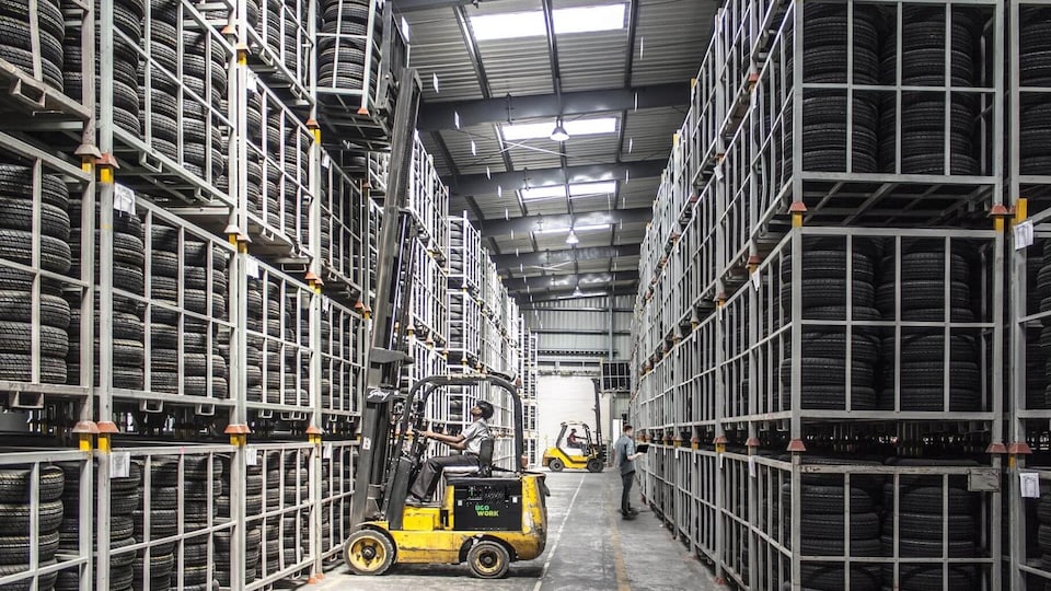 A forklift in a tire warehouse.