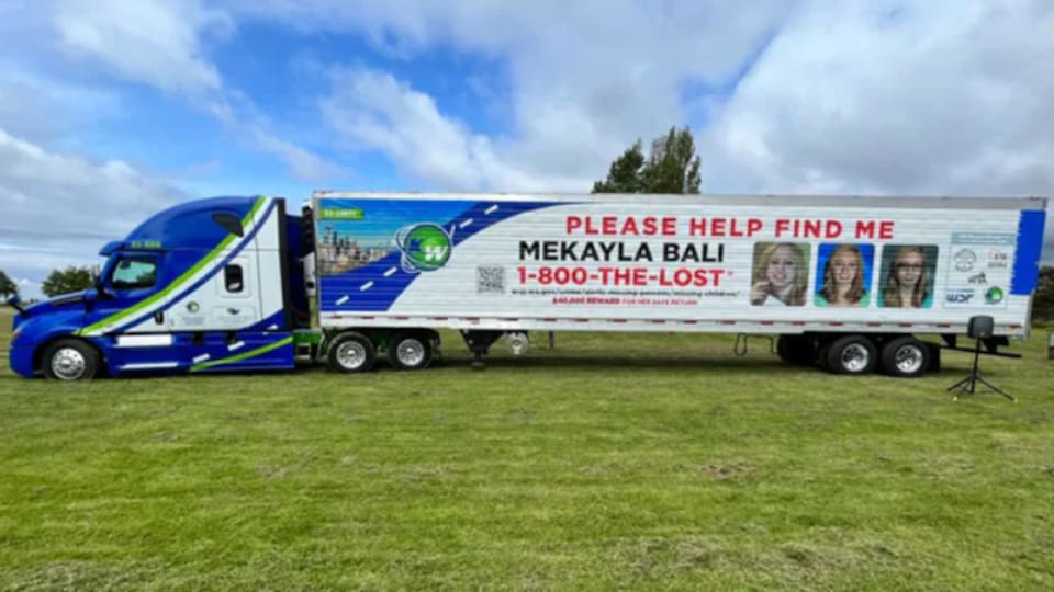 Photos of Mekayla on tractor-trailers traveling in North America.