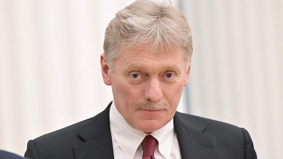 Dmitry Peskov, Kremlin spokesman, looks directly into the camera during a briefing in February. 