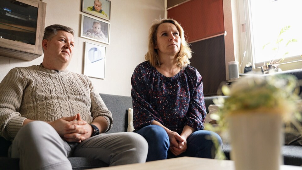Jonathan's father and mother were looking into space.