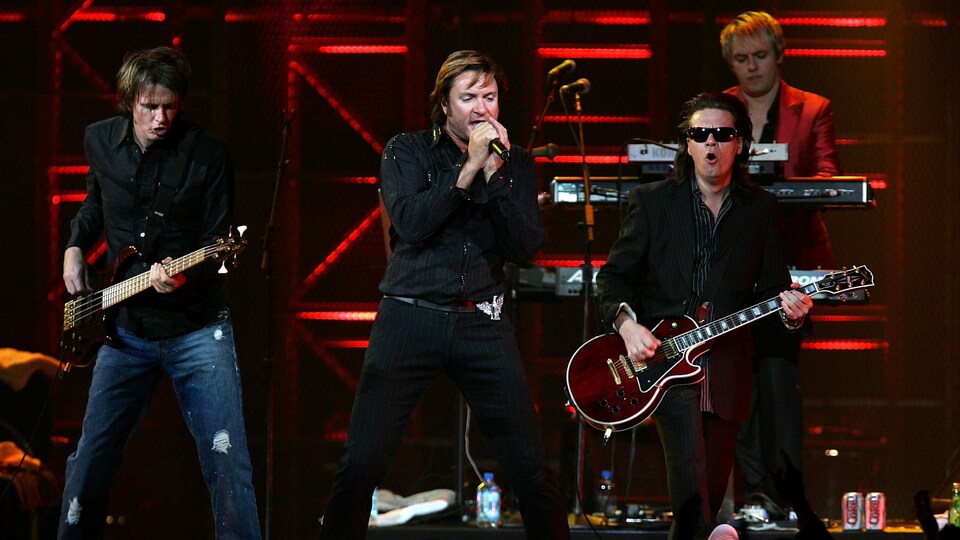 John Taylor, Simon Le Bon et Andy Taylor, de Duran Duran, sur scène.