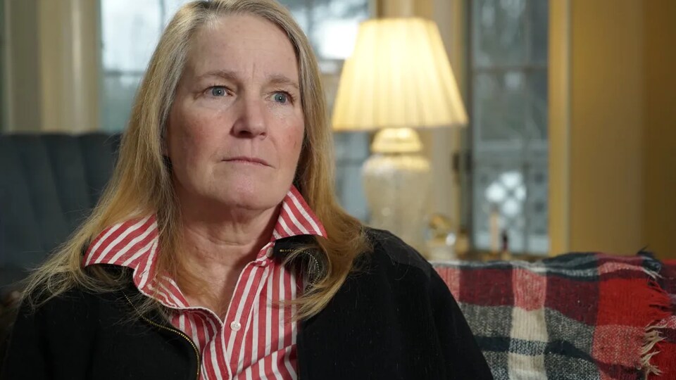 Eileen McLaughlin sat in an armchair.