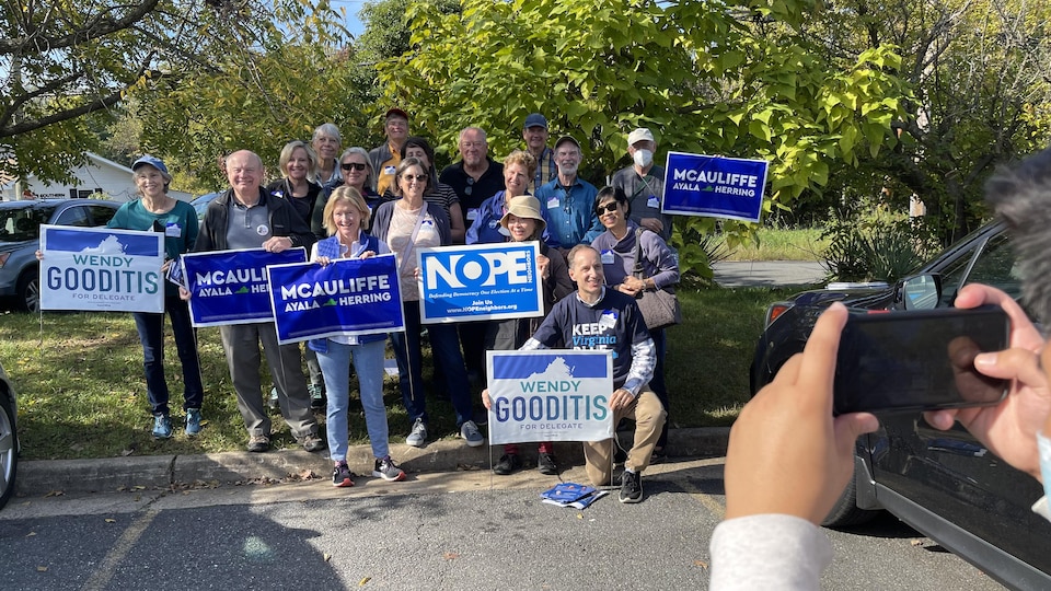 A group of Democratic volunteers prepares to go door-to-door in Lisburg, Virginia.