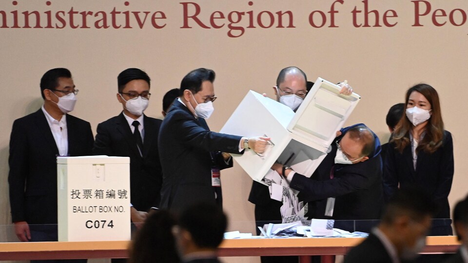 A ballot box is empty during the counting of votes during a Hong Kong election.