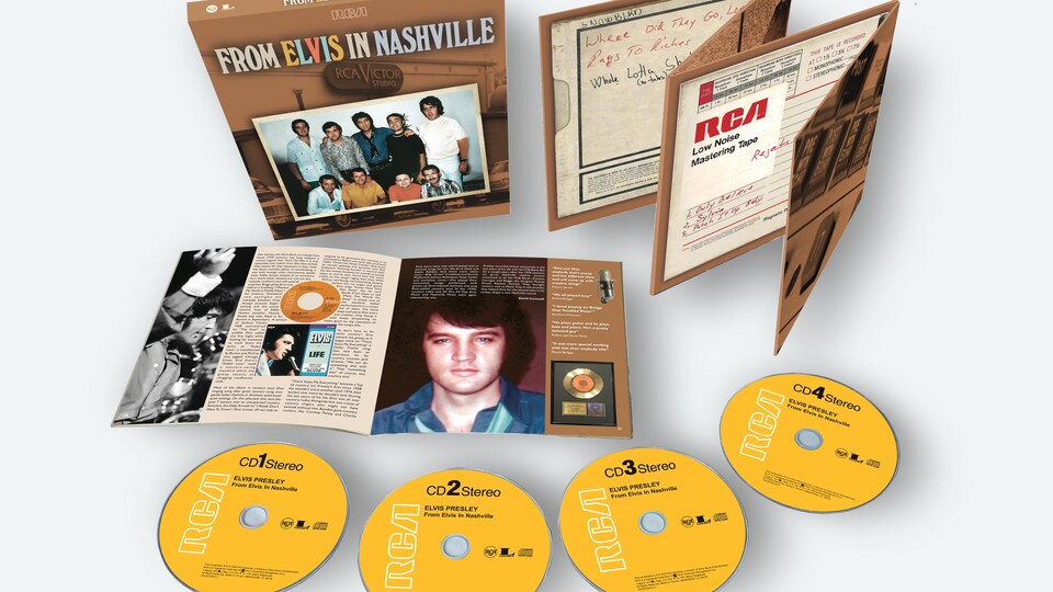 Photo représentant quatre disques et un coffret.