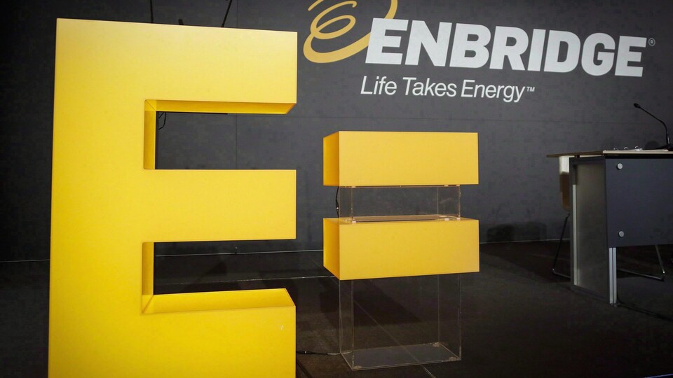Executives from the biggest oilsands companies in Canada say worries about getting their products to market are starting to ease in the wake of the regulatory approval of Enbridge Inc.'s $9-billion Line 3 pipeline replacement project. Enbridge company logos are seen at the company's annual meeting in Calgary, Thursday, May 12, 2016. THE CANADIAN PRESS/Jeff McIntosh
