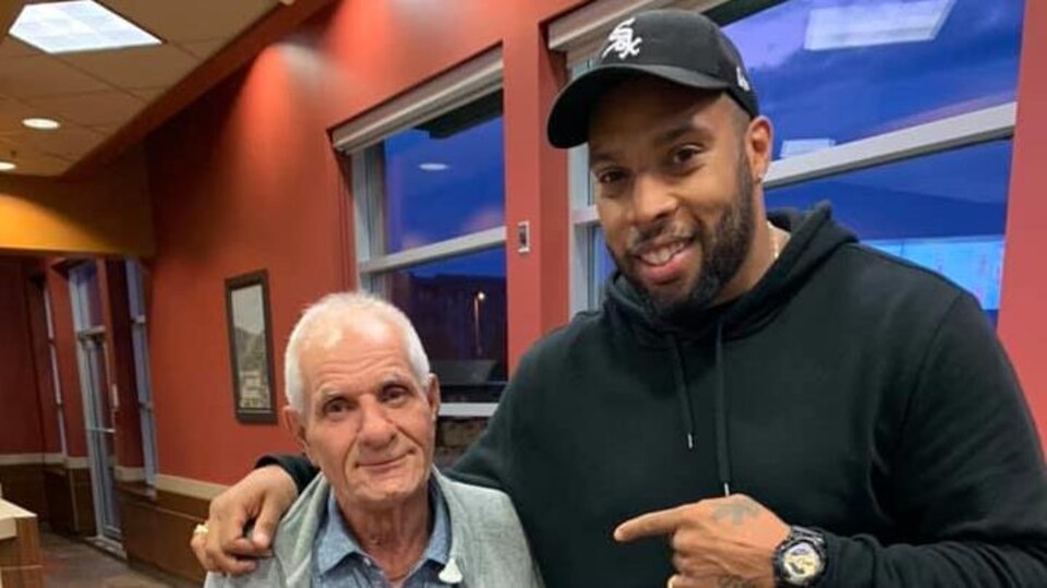 Éric Martel-Bahoéli et l'homme au Tim Hortons après l'événement.