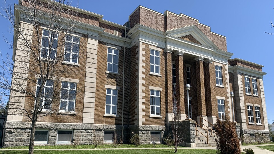An old two-storey brick building.