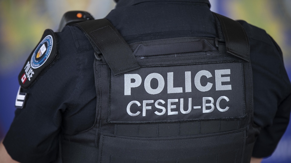An officer from the Combined Forces Special Enforcement Unit of B.C (CFSEU) is pictured during a press conference after a weekend of gang violence around the Lower Mainland in Burnaby, British Columbia on Monday, May 10, 2021.