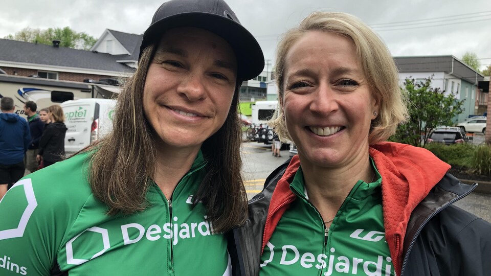 Two women side by side.  They are about to start a cycling challenge. 