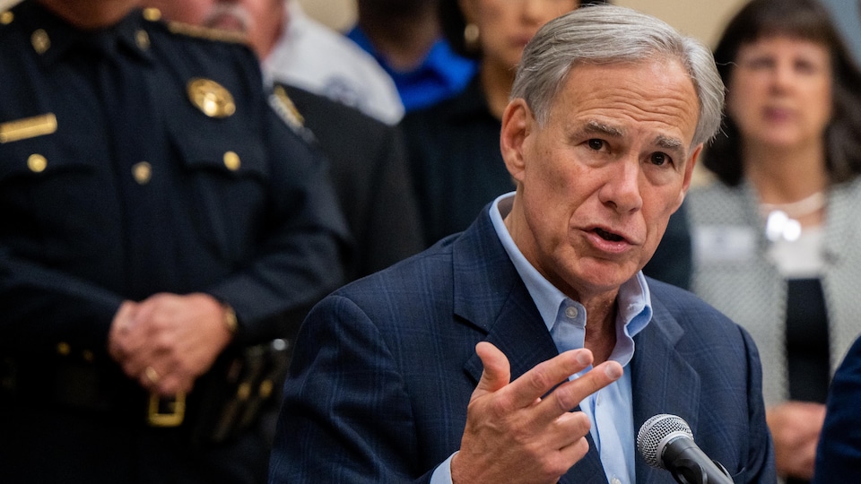 Greg Abbott at a press conference.