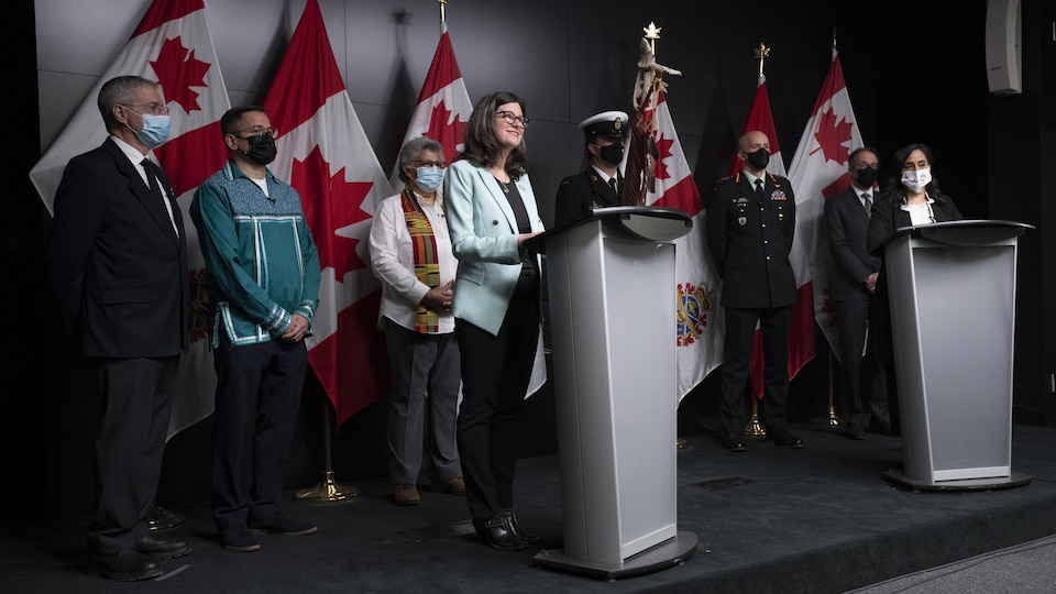 People at a press conference.