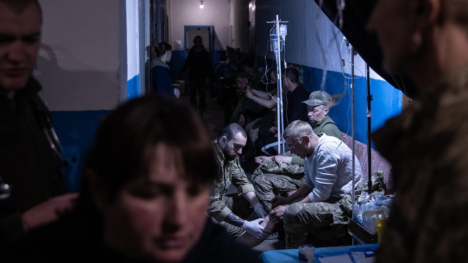 Medical personnel were busy around the injured. 