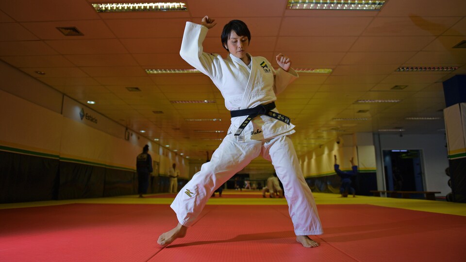 Japanese 35-year-old black belt Yuko Fujii, head coach of the Brazilian men's national team, warms up before giving a class in Rio de Janeiro, Brazil, on June 26, 2018. - Fujii, who previously was an assistant coach with the squad, has made history by becoming in May 2018 one of the very few women in the world to head any top-level male sports team, let alone judo. (Photo by Carl DE SOUZA / AFP) (Photo credit should read CARL DE SOUZA/AFP/Getty Images)