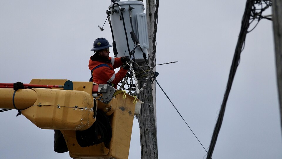 A man near the power wire.