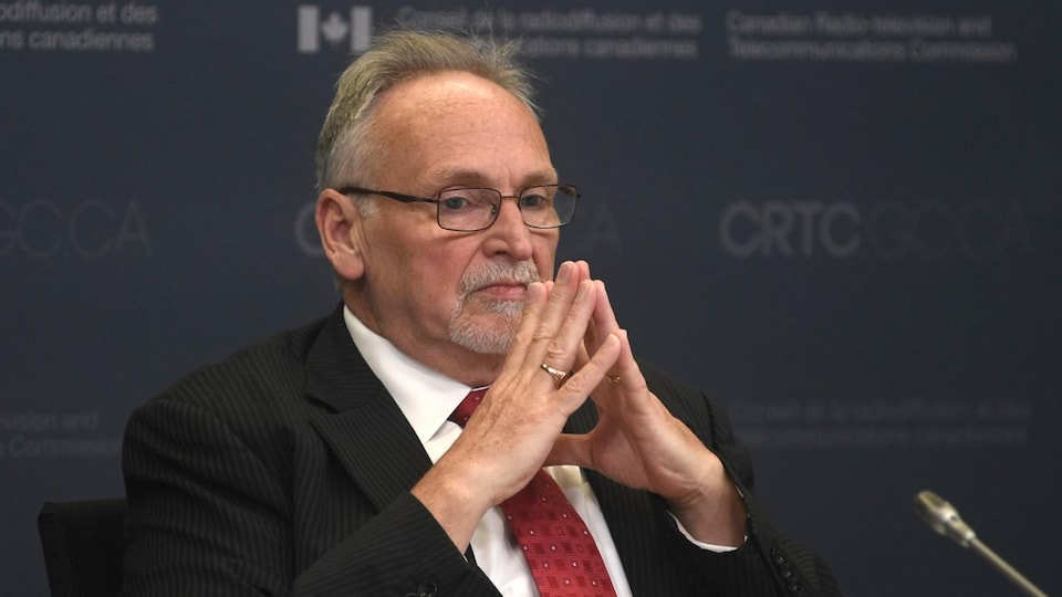 Ian Scott presided over a CRTC hearing.