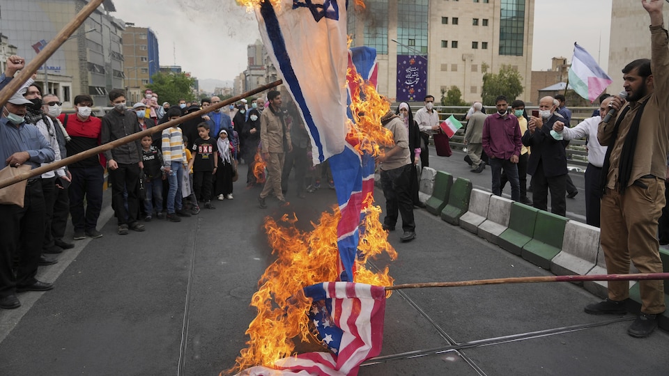 Protesters burned Israeli, British and American flags at the annual pro-Palestinian rally.