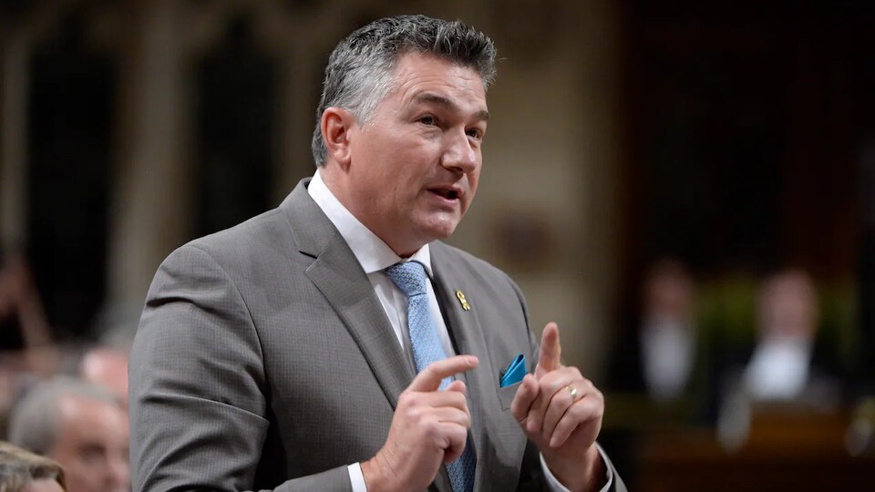 James Bezan standing in the Chamber.