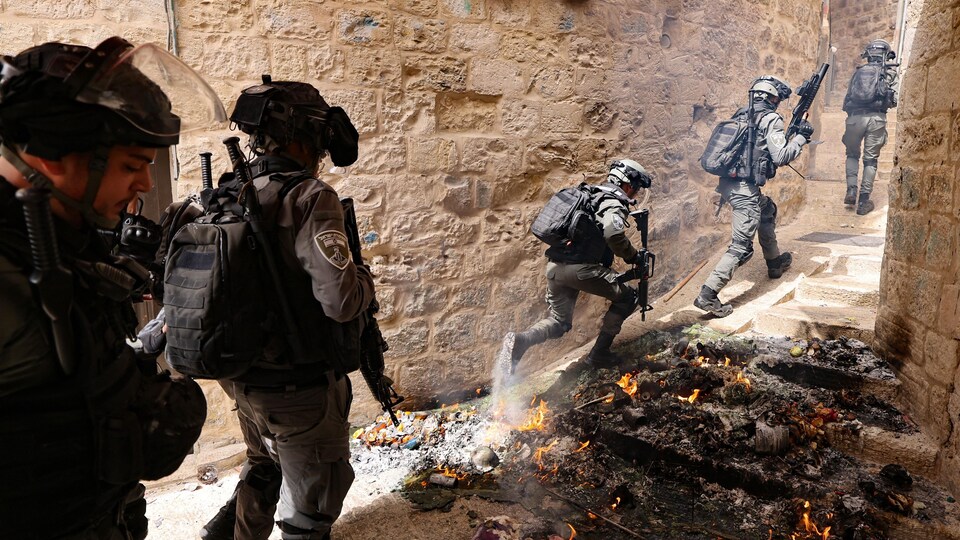 Armed police are running in the Old City of Jerusalem.