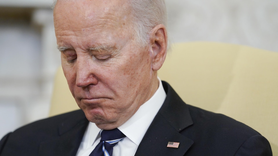 Joe Biden looks disappointed.