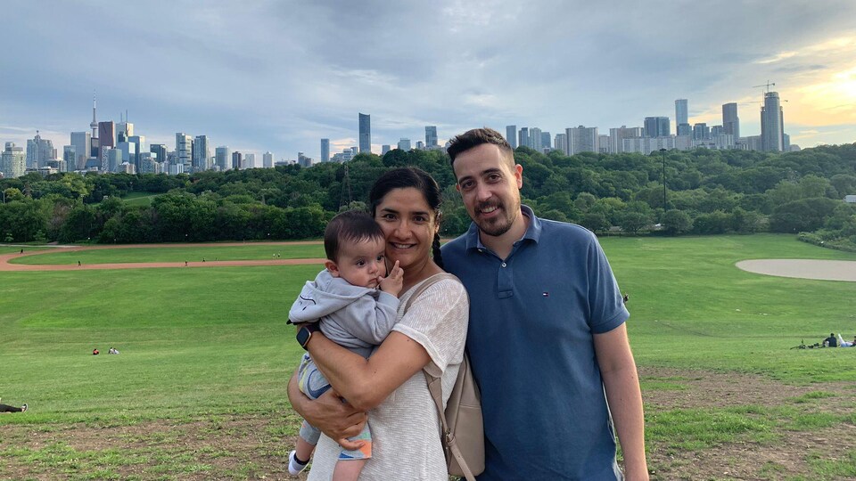 Juliet Alam with her husband and child.