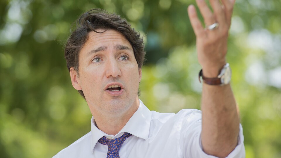 Justin Trudeau lors d'une annonce sur les services de garde au Québec dans un parc à Montréal.