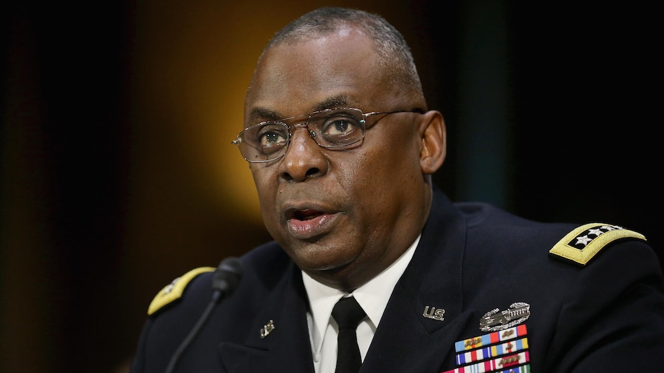 Lloyd Austin, wearing several military decorations, testifying before a congressional committee (on file)