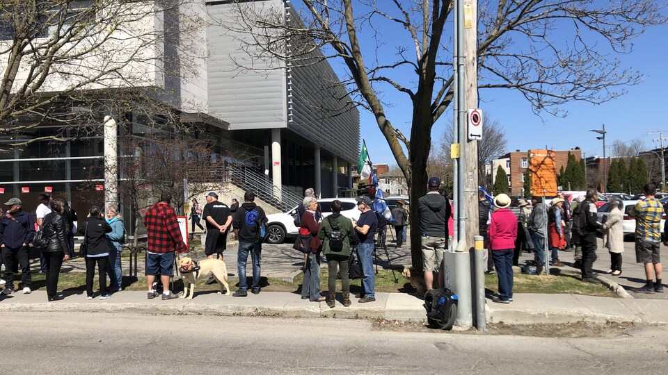 People gathered outside the courthouse.