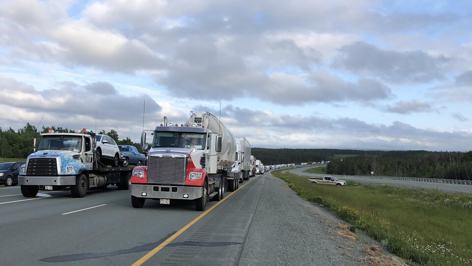 Trucks were parked on a road.