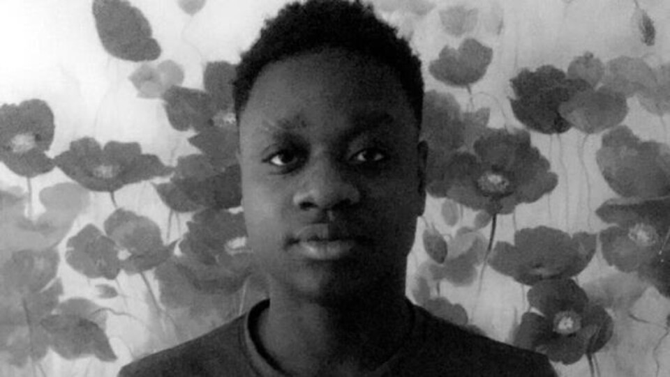 Photographie d'un jeune homme.