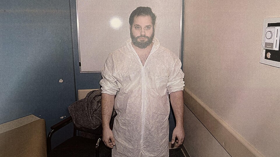 Maxime Labrie in a white jumpsuit.