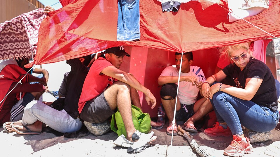 Asylum seekers in a tent.