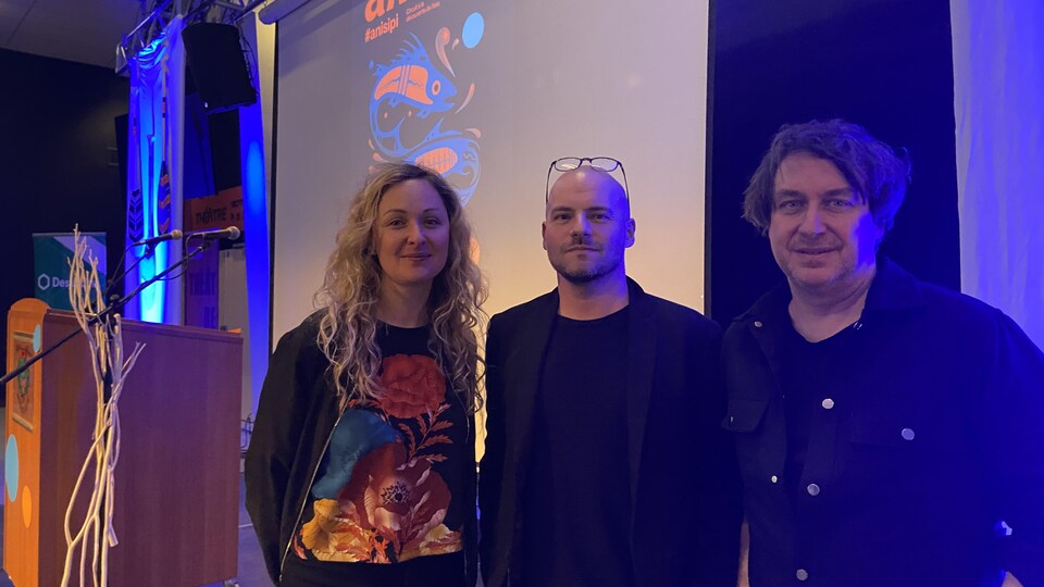 The Moment Factory team delegation: Marie-Pier Veilleux, public affairs and international relations director, Pierre-Olivier Perron, producer, and Éric Morin, multimedia director.