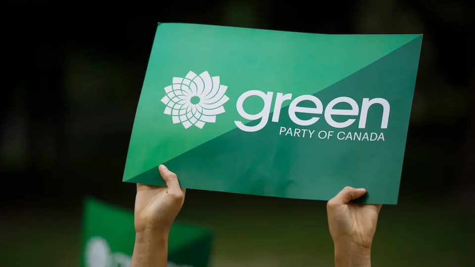 Une pancarte aux couleurs du parti.
