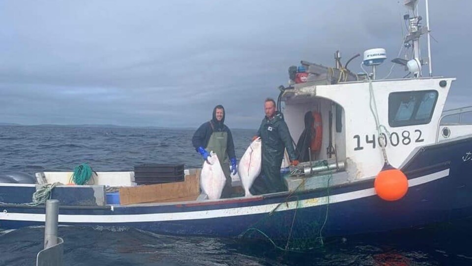 Marc Russell et Joey Jenkins à bord de leur bateau.