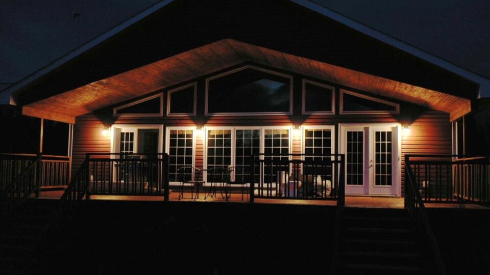 A house lit at dusk.