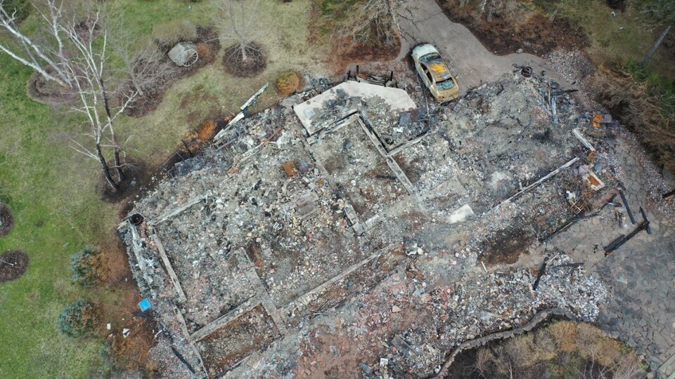 The foundation of a large house that burned.