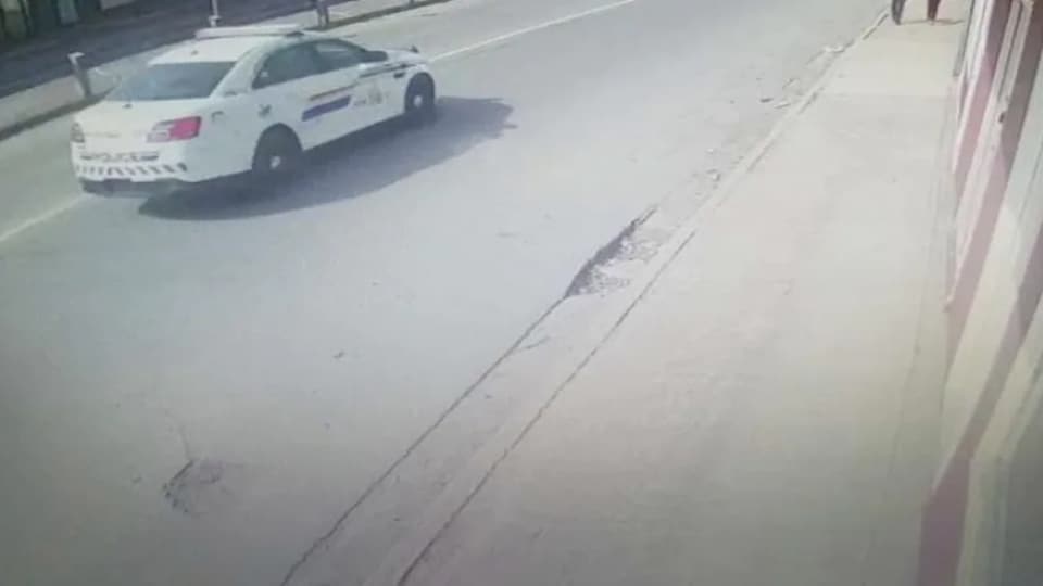 The shooter's vehicle passed near a business.