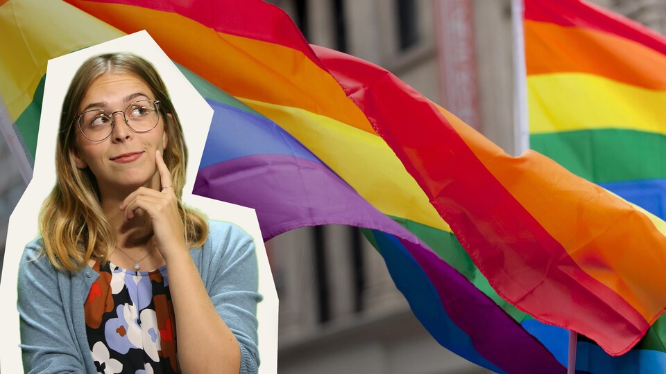 Rosalie devant un drapeau multicolore