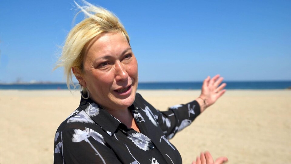 Elena Motassova on a beach.