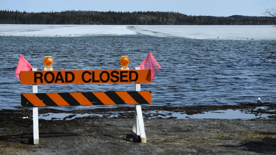A barrier indicates that a road is closed.