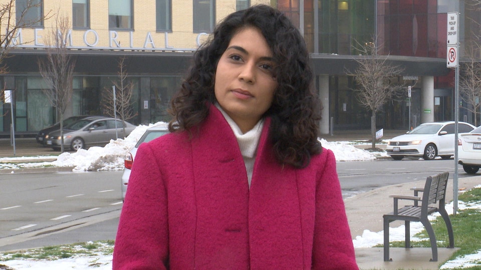 Sara Singh answers questions from a reporter outside the Brampton Urgent Care Center.