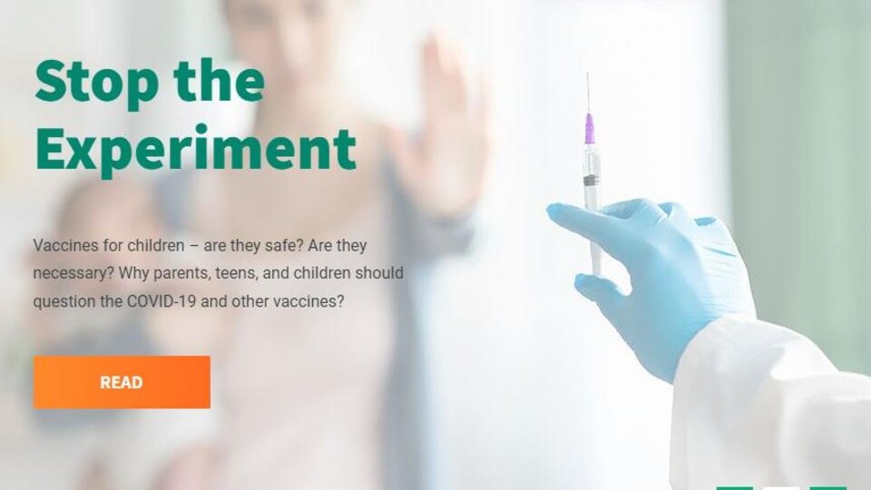 A picture of a gloved hand holding a syringe, with the slogan already 