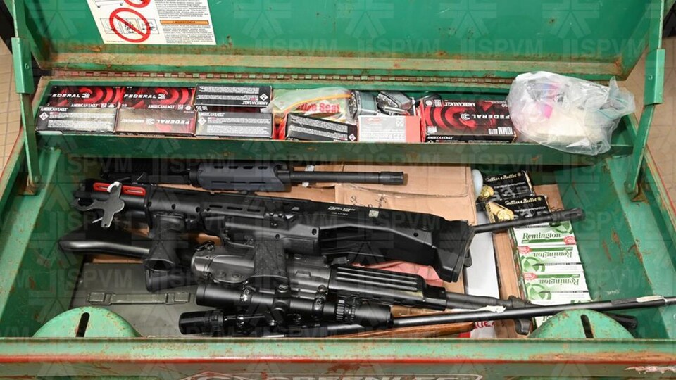 A chest containing weapon parts and ammunition.