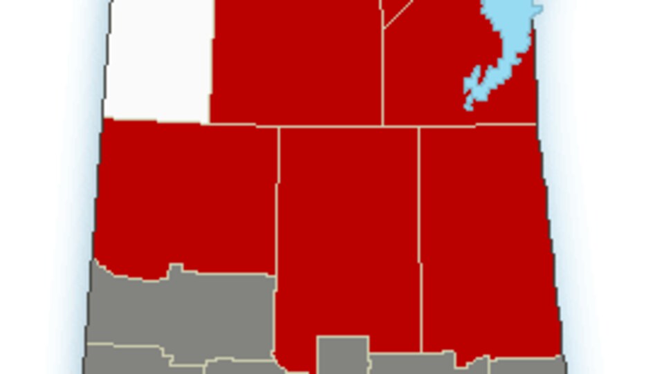 Une carte d'Environnement Canada montrant les secteurs de la Saskatchewan touchés par un avertissement de tempête hivernale.