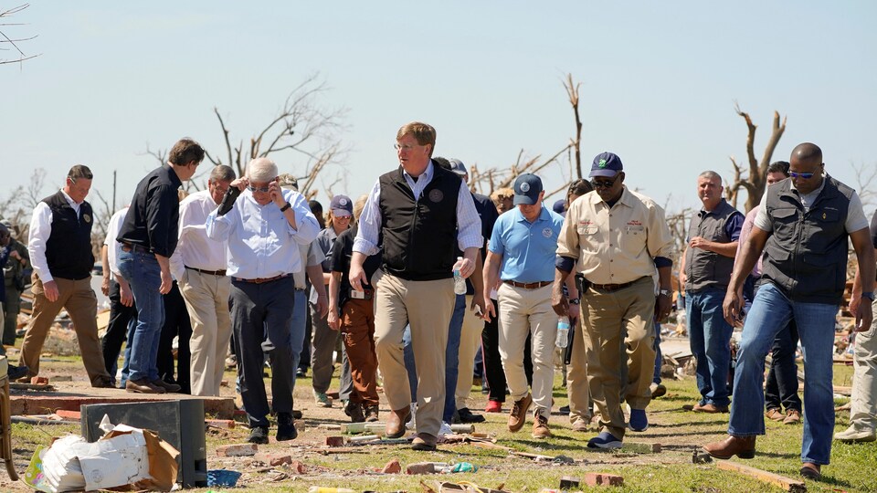 Mississippi Governor Tate Reeves visits the town of Rolling Fork after thunderstorms spawning high straight-line winds and tornadoes ripped across the state, in Rolling Fork, Mississippi, U.S. March 26, 2023.  REUTERS/Cheney Orr