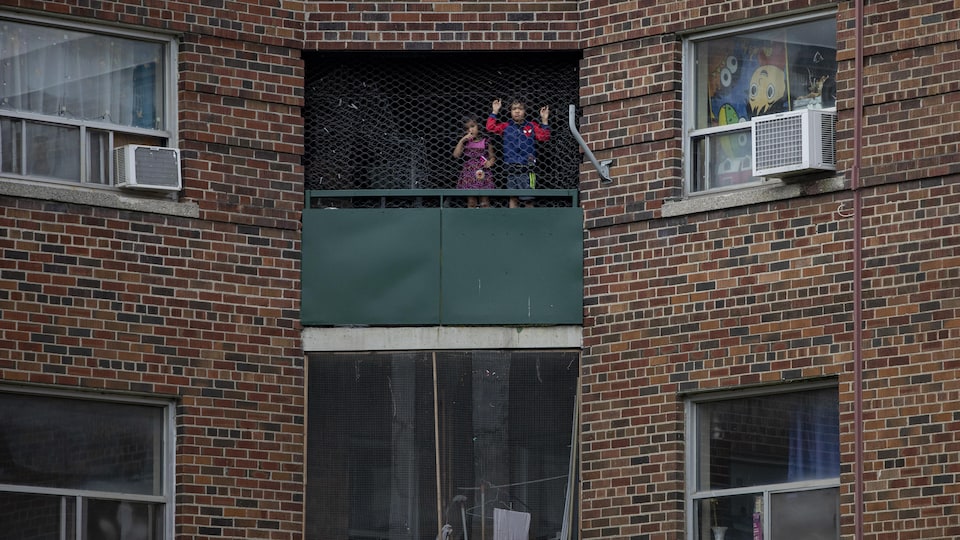 Children on their balcony. 