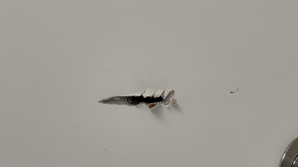 A dozen bullet marks were found inside Jacqueline's home.